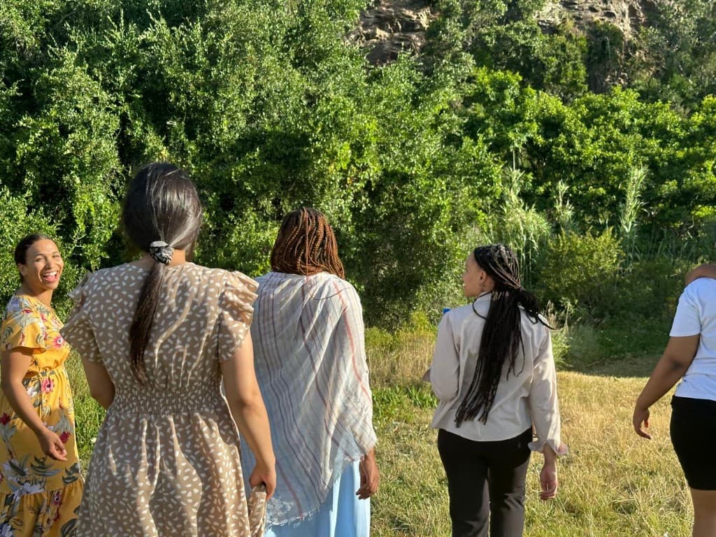 Friends laughing together outdoors